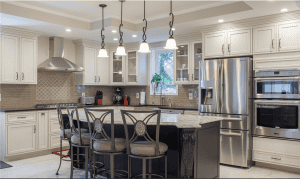 Modern kitchen featuring quartz worktop, stainless steel appliances, and elegant cabinetry, ideal for contemporary home design.