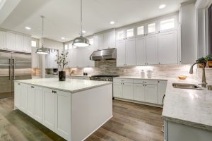 Stylish modern kitchen featuring white cabinetry and quartz countertops, ideal for contemporary home designs and renovations.